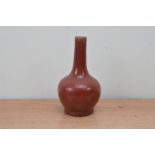 A Chinese ceramic vase, with a Sang de Boeuf glaze, with some wear 18.5cm high AF