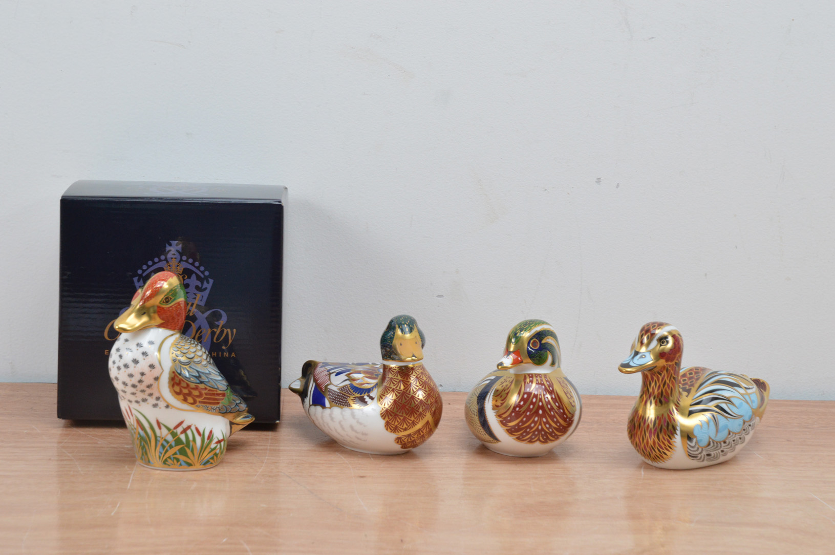 Four Royal Crown Derby bone china paperweights, all ducks, The Collectors Guild Duck, Green Winged