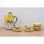 A 20th century Royal Worcester porcelain art deco design part coffee set, comprising five saucers,