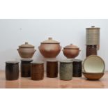 A collection of 20th century studio pottery kitchen items, comprising seven Harry Stringer stoneware