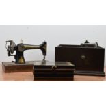 A Singer sewing machine, in a wooden case with removable lid, together with a His Masters Voice