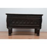 An 18th century style small coffer, late 19th century and later, a carved panel front, lift up lid
