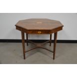 An Edwardian string inlaid occasional table, octagonal top, with central inlaid cartouche, the