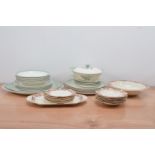 A collection of Wedgwood Woodbury pattern dinner wares, green with floral design, printed and