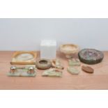 A collection of hardstone items, mostly ashtrays in a variety of materials, shapes and sizes,