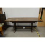 A 19th century and later refectory table, stained oak, what appears to be an extension, supported