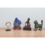 Four pieces of Far Eastern works of Art, comprising a Lapis lazuli carving on a stand 18cm H, a gilt