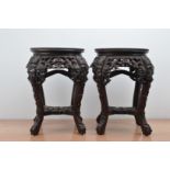 A pair of 20th century Chinese hardwood Jardinieres, both tops with marble inserts, pierced