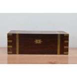 A 19th century mahogany and brass banded writing slope, fitted interior with a black tooled