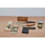 A collection of assorted works of art, including horn handle carving knife and fork, a cased