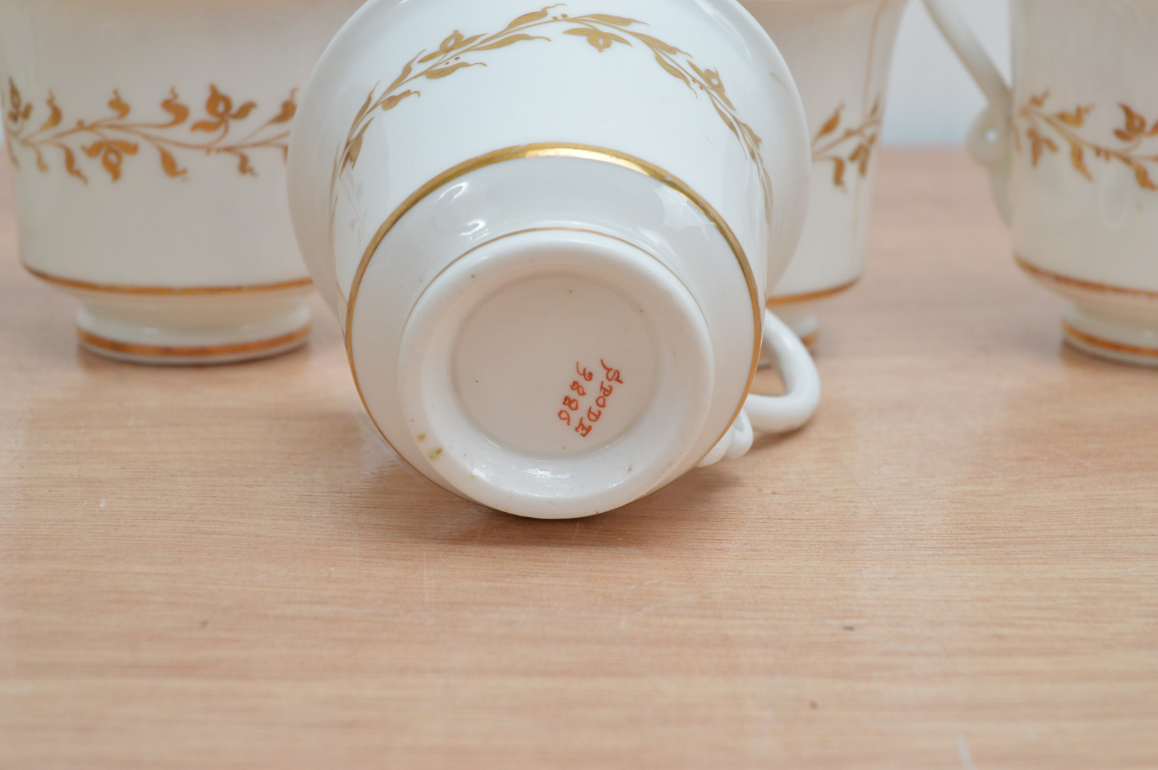 Six early 19th century Spode porcelain tea cups, hand painted floral design with gilt work on a - Image 4 of 4