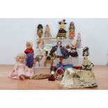 A mixed lot of collectables, including mostly a range of dolls, of differing shapes AF (qty)