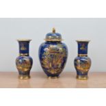 Three items of 20th century Chinoiserie Carltone Ware, heightened gilt on a blue ground,