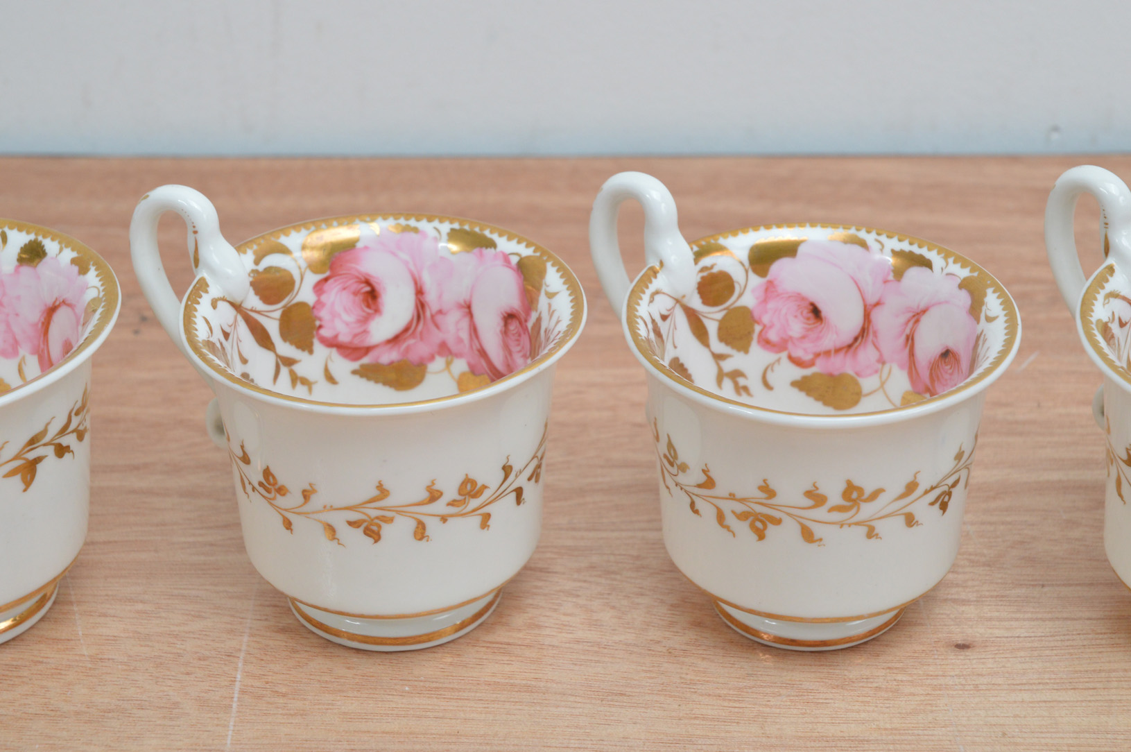 Six early 19th century Spode porcelain tea cups, hand painted floral design with gilt work on a - Image 2 of 4