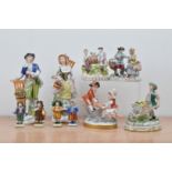 A collection of 20th century Continental porcelain figurines, including Sitzendorf figurines, of