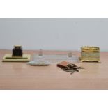 A collection of desk items, comprising an art deco ink stand, a brass box, a glass pen stand 21cm in