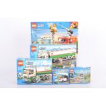Lego City, all boxed, three factory sealed, 3177 (car) some paper loss to box, 40170 (street