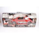 Quality Toys Radio Control New Beetle, a boxed 1:6 scale plastic radio controlled model in red
