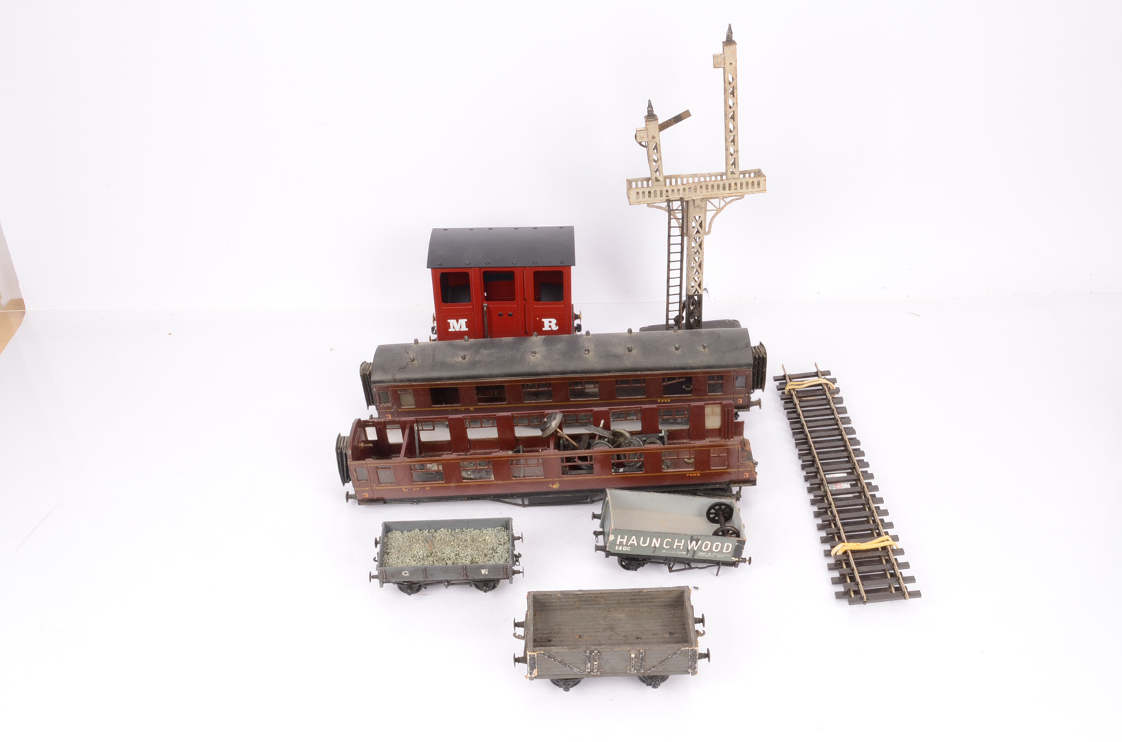 A Mixed Assortment of 0 Gauge Trains and Accessories, including Marklin 20v electric locomotive