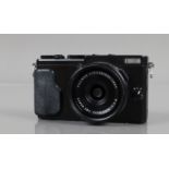 A Fujifilm X70 Digital Camera, serial no. 6AQ02183, with Fujinon Super EBC f/2.8 18.5mm lens, in