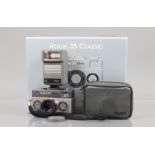 A Rollei 35 Classic Titan 35mm Compact Camera, serial no 7150138, shutter working, meter responsive,