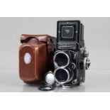 A Tele Rolleiflex TLR Camera, Model I, serial no S 2303581, shutter sometimes sluggish on one