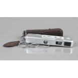 A Minox B Sub Miniature Camera, shutter working, meter responsive, body VG, elements VG, with chain,
