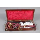 A mid-19th Century velvet-lined mahogany Surgeon's Amputation Instruments Case, incomplete,