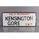 A City of Westminster enamel road sign, for Kensington Gore, S.W.7, black and red lettering on white