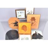 An assortment of Winston Churchill framed and wall hanging items, including various marquetry items,