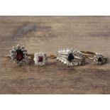 Four gold dress rings, all set with coloured gems, including garnets, rubies, sapphires and