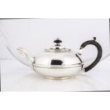 An Edwardian silver teapot by George Nathan & Ridley Hayes, 17.3 ozt, squat form with applied