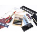 A collection of vintage and modern pens and drawing equipment, including nine vintage fountain pens,