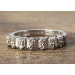 An 18ct white gold diamond half hoop dress ring, the seven pairs of eight cuts, ring size N, 3.6g