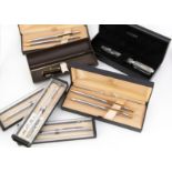 A collection of vintage and modern pens and pencils, including a pair of Cross gold plated biros,