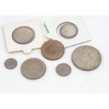 A group of seven George V coins, all 1935 and EF, including a crown, half crown, florin, shilling,