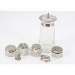 An Art Deco period silver and glass sugar sifter, together with four small glass and silver pots,