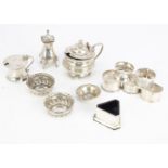 A group of silver cruet and other table ware items, including a George III silver mustard, a