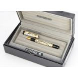 A modern Parker Duofold ball point pen, in Parker box, in Mother of Pearl style with gilt trims,