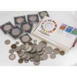 A small collection of world coins, including three US dollars, two 1879, worn and a 1921 example, an