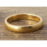 A 22ct gold wedding band, court shaped, 3.6mm ring size O, 5.5g