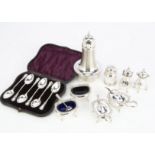 A six piece silver cruet set, together with an Art Deco silver sugar sifter, a silver pounce pot