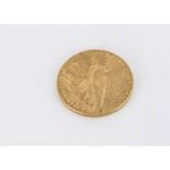 An early 20th century United States gold five dollar coin, dated 1909, VF