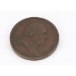 A 19th century French copper commemorative medallion, celebrating Louis XVIII, dated 1822, some