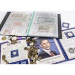 A mixed collection of World coins, one box with various loose coinage along with an album with
