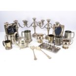 A collection of silver plate, also a silver mounted photograph frame, also a serving dish with three