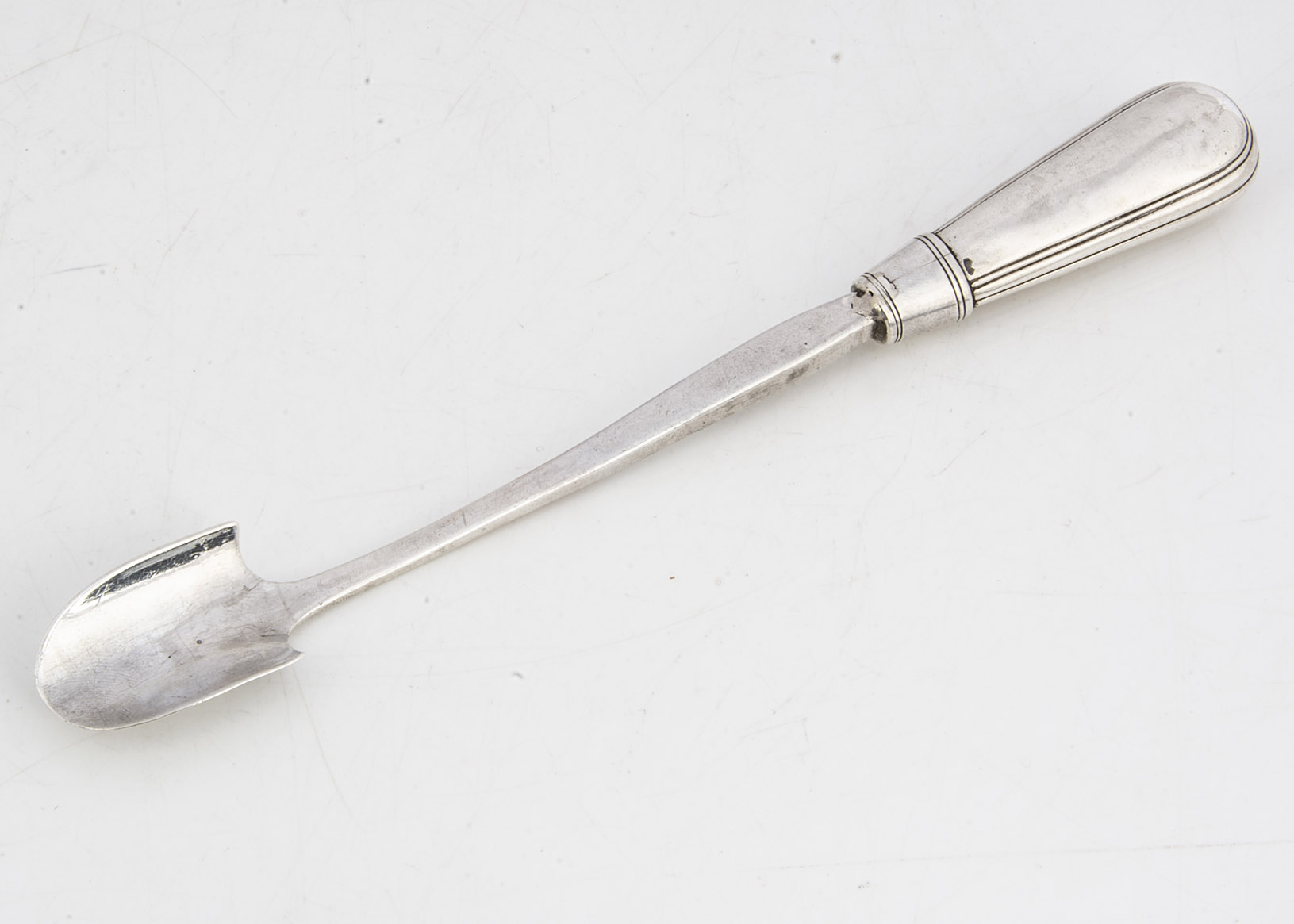 A George III silver stilton scoop by IS, 24cm long, silver filled handle dented and possibly added
