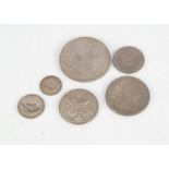 A group of six George V coins, all 1935 and EF, including a crown, half crown, florin, shilling, six