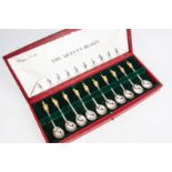 A set of ten 1970s silver commemorative spoons, titled The Queen's Beasts, celebrating the silver