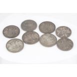 Six Victorian crowns and two double florins, including an 1847, worn, and dates for 1887, 1889,